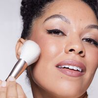 model with face brush